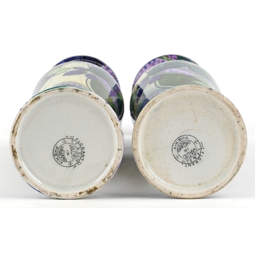 330 - A matched pair of Thomas Forrester & Sons Phoenix Ware baluster vases, each decorated with fruit, th... 