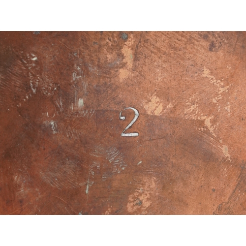 525 - An early 20th century copper watering can, 20cm high.