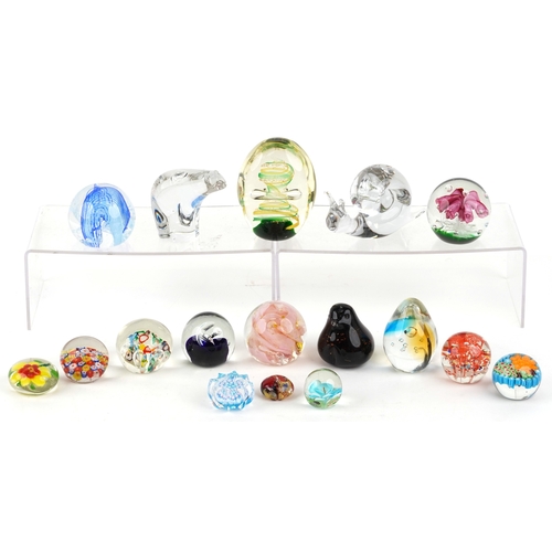 639 - A collection of glass paperweights including Caithness, Wedgwood and millefiori examples, the larges... 