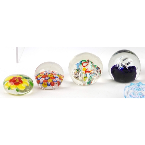 639 - A collection of glass paperweights including Caithness, Wedgwood and millefiori examples, the larges... 