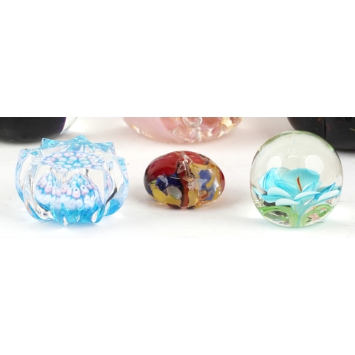 639 - A collection of glass paperweights including Caithness, Wedgwood and millefiori examples, the larges... 