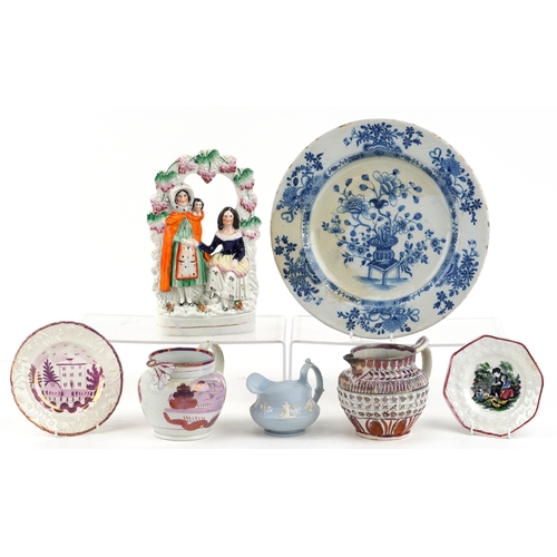 435 - Victorian porcelain including lustreware jugs and a Staffordshire flatback figure group, the largest... 