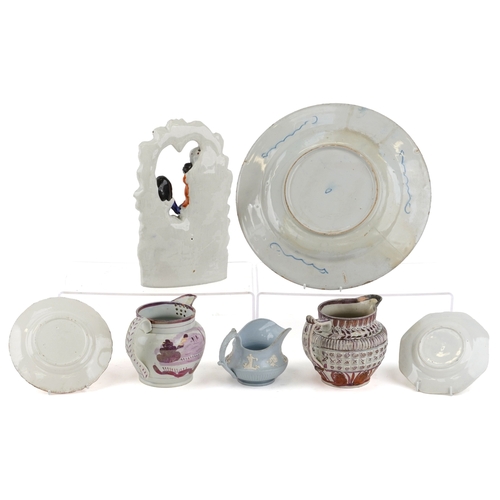 435 - Victorian porcelain including lustreware jugs and a Staffordshire flatback figure group, the largest... 