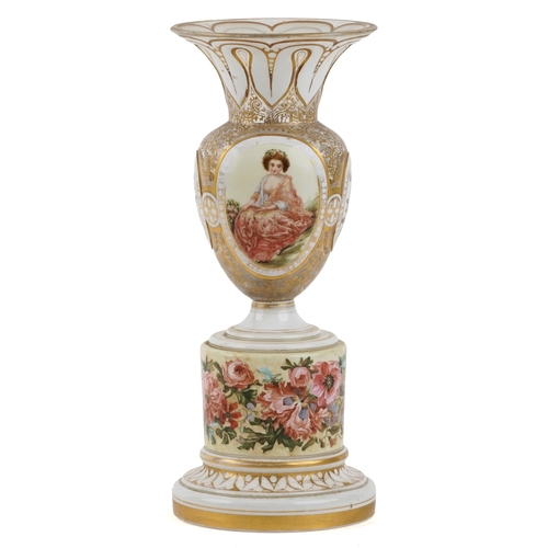  A 19th century enamelled glass vase hand painted with floral panels and a young female, raised on a ... 