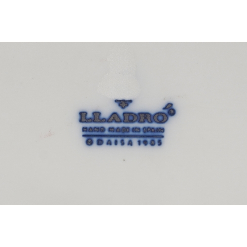 606 - A Lladro figure of The Lady of The East, 24cm high.