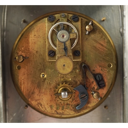  Archibald Knox for Liberty & Co., an Art Nouveau pewter tudric clock with copper dial and enamelled ... 