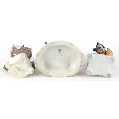 29 - Three continental hand painted porcelain figures including a Sitzendorf figure group of a courting c... 