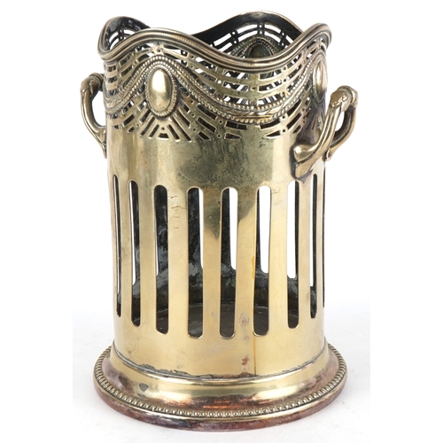 1532 - A 20th century silver plated twin handled wine bottle holder with pierced frieze, 20cm high.