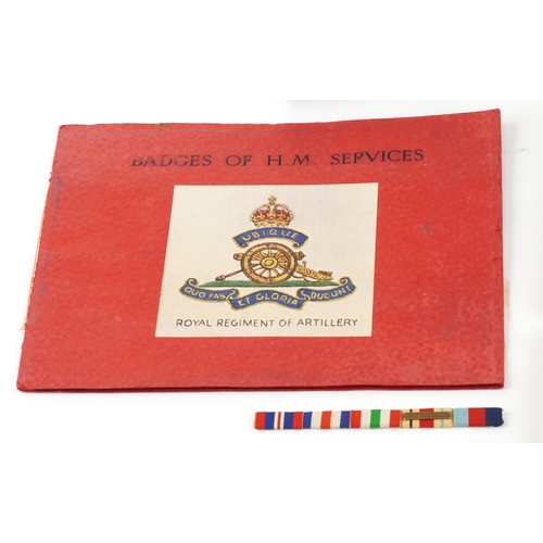 2770 - Militaria including a Royal Navy sweetheart pouch, first aid tin and Badges of HM Services book.