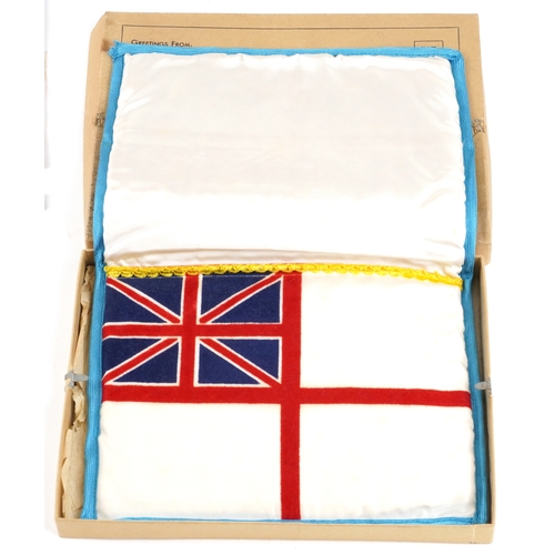 2770 - Militaria including a Royal Navy sweetheart pouch, first aid tin and Badges of HM Services book.