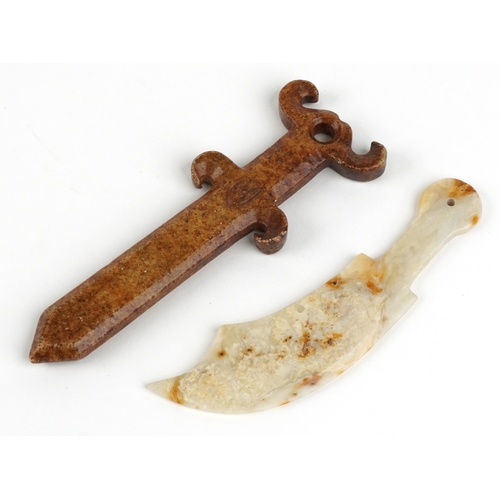 468 - A Chinese carved white and russet stone dagger together with a similar example, the largest 18cm in ... 