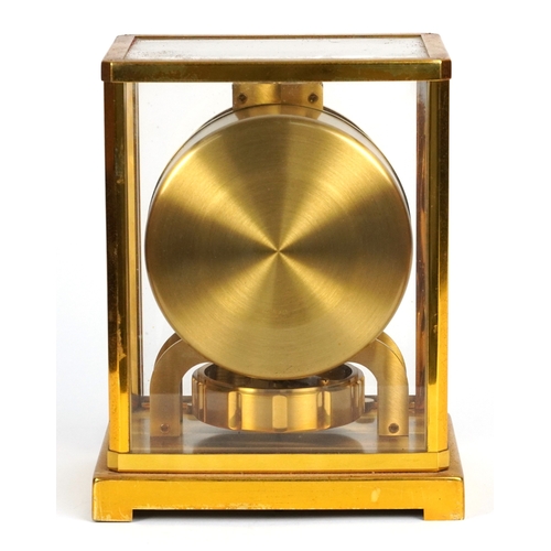 19 - A Jaeger Le Coultre four glass Atmos clock within a gilt brass case, 22.5cm H x 18cm W x 13.5cm D.