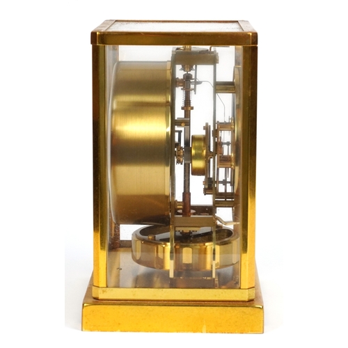 19 - A Jaeger Le Coultre four glass Atmos clock within a gilt brass case, 22.5cm H x 18cm W x 13.5cm D.
