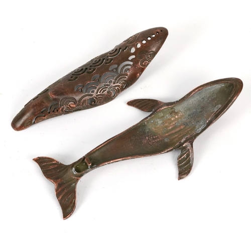510 - A Japanese patinated bronze censer in the form of a whale, character marks to the base, 16cm in leng... 