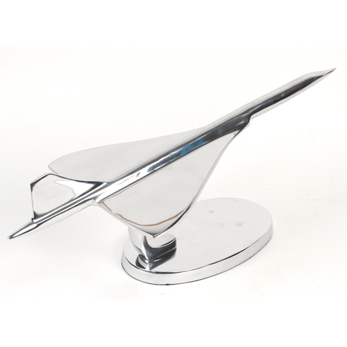 1577 - A chromed metal model of Concorde, 42cm in length.