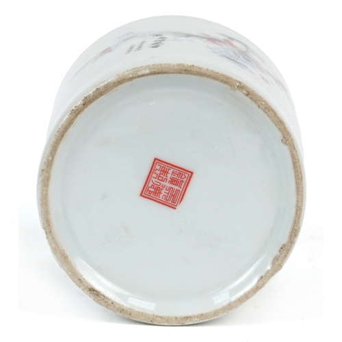 1694 - A Chinese porcelain brush pot decorated with birds in trees, 12cm high.