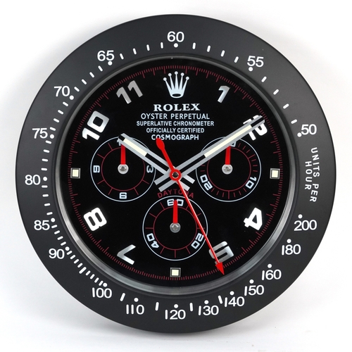 1516 - A Rolex Oyster Perpetual Daytona display wall clock, 34cm in diameter.