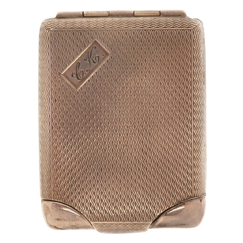 3614 - An Art Deco engine turned silver matchbook case, possibly Birmingham 1930, 6cm in length, 23.9g.