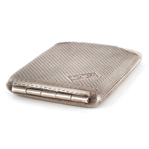 3614 - An Art Deco engine turned silver matchbook case, possibly Birmingham 1930, 6cm in length, 23.9g.
