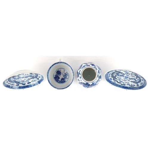 355 - Chinese blue and white porcelain comprising a tea cup, two saucers and a jar with cover, each hand p... 