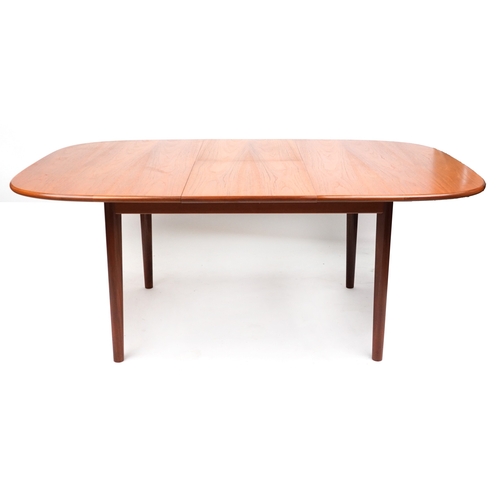 2124A - A mid 20th G Plan century teak extending dining table raised on turned legs, 73cm H x 183cm L extend... 