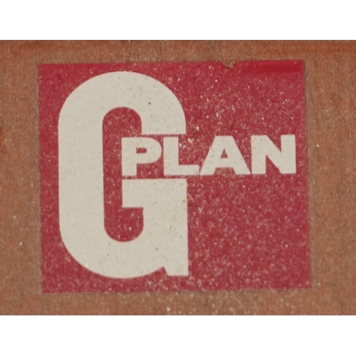 2124A - A mid 20th G Plan century teak extending dining table raised on turned legs, 73cm H x 183cm L extend... 