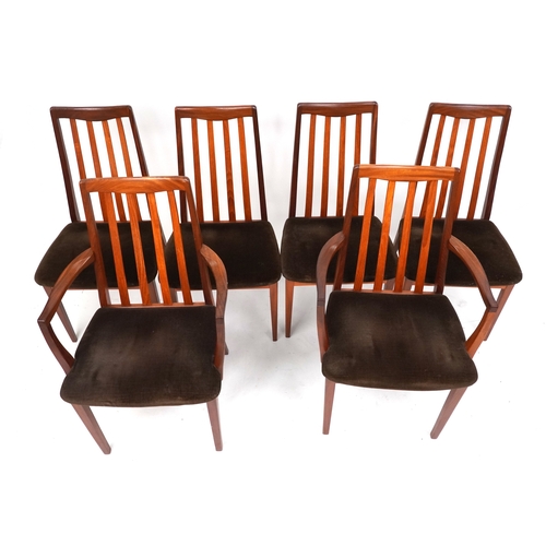 2147 - A set of six mid 20th century G Plan teak dining chairs comprising two carvers and four standard, 91... 