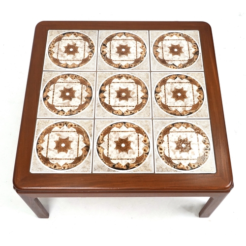 2148 - A mid 20th century teak square coffee table, the top inset with tiles, raised on block legs, 37cm H ... 