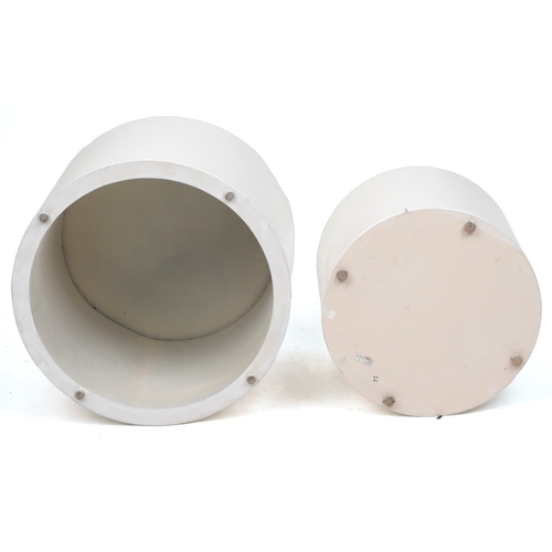 2050 - A pair of late 20th century white fibreglass cylindrical nesting tables, 38cm high x 48cm in diamete... 