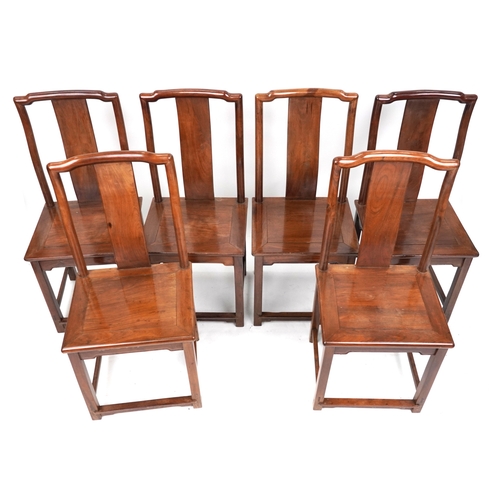 2023 - A set of six Chinese hardwood dining chairs, early 20th century, the splat backs above solid seats, ... 