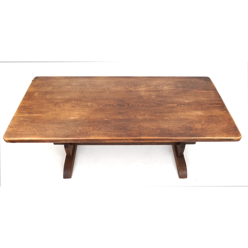 2127 - A 20th century oak refectory table, the rectangular top raised on shaped supports and bracket feet, ... 