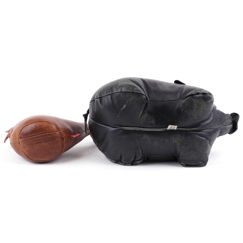 1817 - A Monica Richards brown leather doorstop in the form of a chicken, 23cm high together with a Hide & ... 