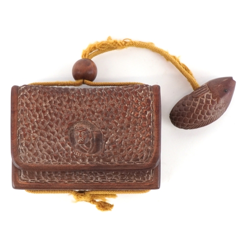 1466 - A Japanese hardwood inro carved with a fish netsuke, overall 19cm in length.