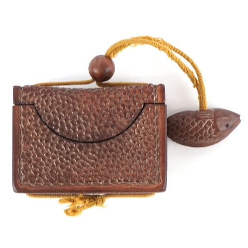 1466 - A Japanese hardwood inro carved with a fish netsuke, overall 19cm in length.