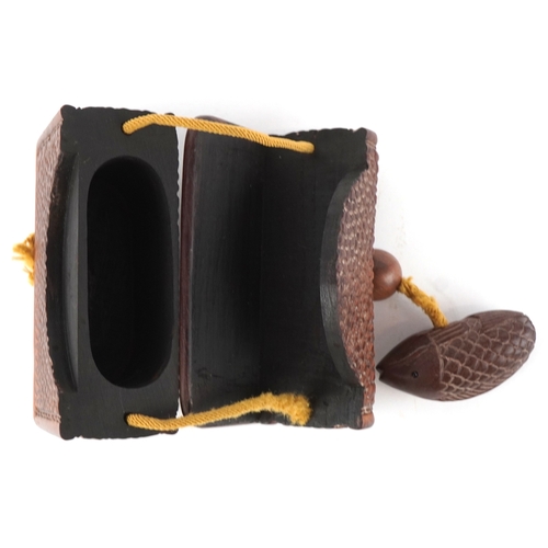 1466 - A Japanese hardwood inro carved with a fish netsuke, overall 19cm in length.