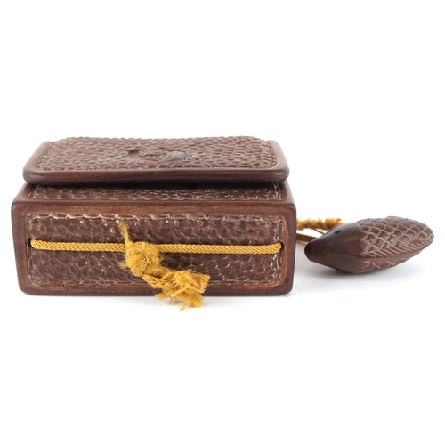 1466 - A Japanese hardwood inro carved with a fish netsuke, overall 19cm in length.