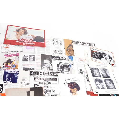 1335 - A collection of exhibitor's campaign books and other theatre ephemera including Disney's Sleeping Be... 