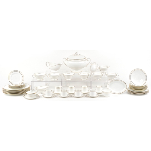 694 - A Royal Worcester part coffee and dinner service in the Contessa pattern including eight coffee cups... 