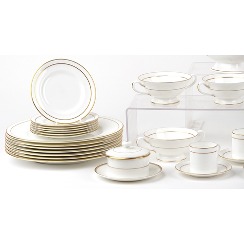 694 - A Royal Worcester part coffee and dinner service in the Contessa pattern including eight coffee cups... 