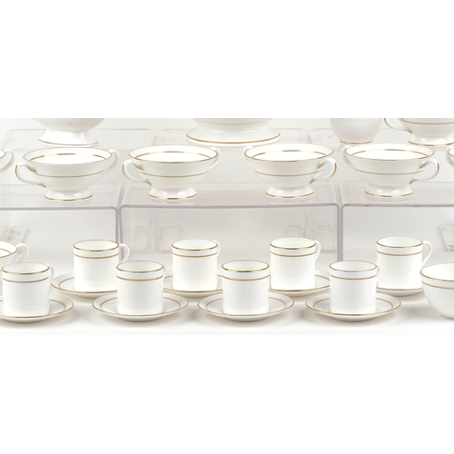 694 - A Royal Worcester part coffee and dinner service in the Contessa pattern including eight coffee cups... 