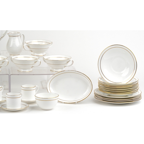 694 - A Royal Worcester part coffee and dinner service in the Contessa pattern including eight coffee cups... 