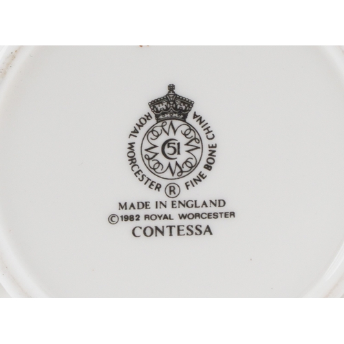 694 - A Royal Worcester part coffee and dinner service in the Contessa pattern including eight coffee cups... 