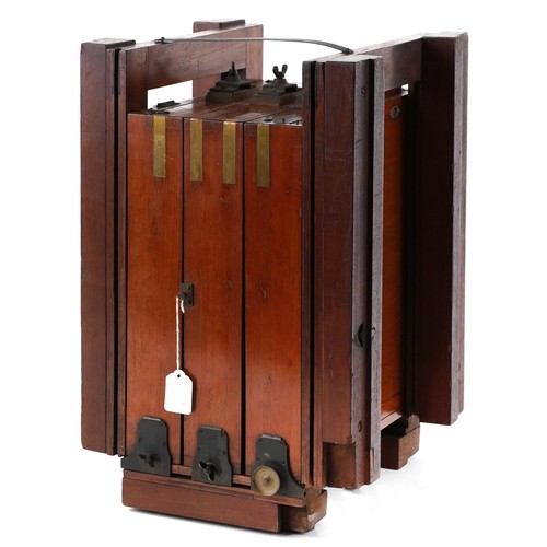  A large 19th century brass bound mahogany double bellow plate field camera, 112cm in length.