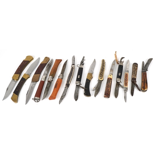 538 - A collection of pocket knives and tools including horn design examples, the largest 12cm in length.