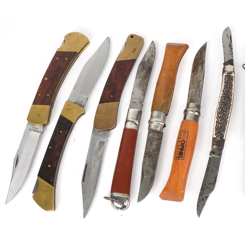 538 - A collection of pocket knives and tools including horn design examples, the largest 12cm in length.