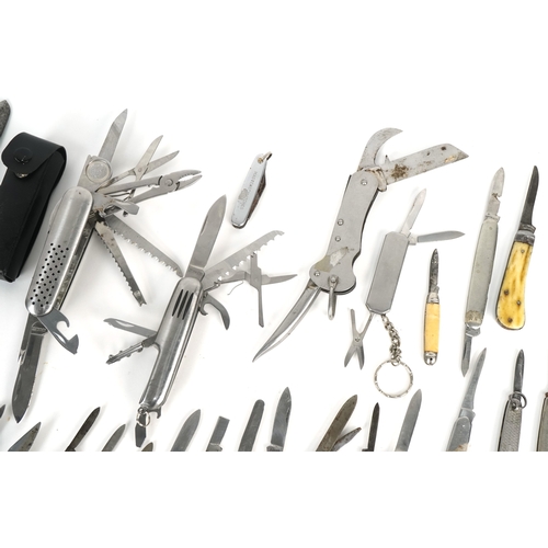 A collection of pocket knives and tools including horn flanked examples ...