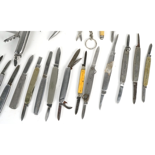 A collection of pocket knives and tools including horn flanked examples ...