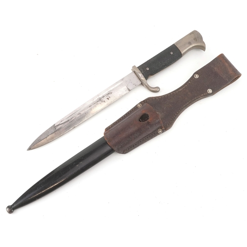 2847 - A German military interest bayonet and scabbard with a leather frog, the blade engraved A Evertz Sol... 