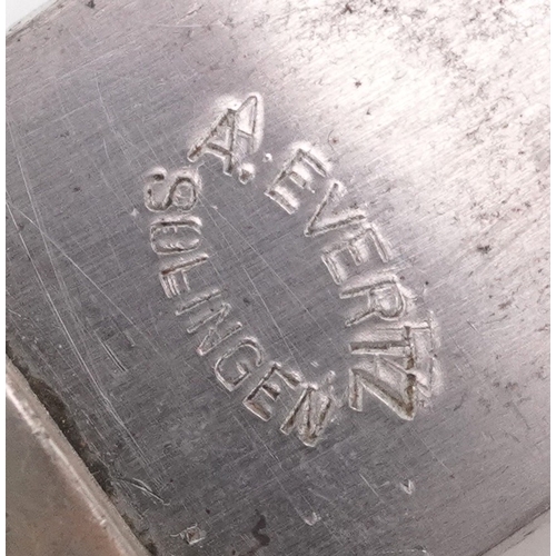 2847 - A German military interest bayonet and scabbard with a leather frog, the blade engraved A Evertz Sol... 