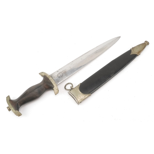 2845 - A German military interest fighting dagger and sheath, 37cm in length.